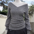Grey off the shoulder cable knit sweater