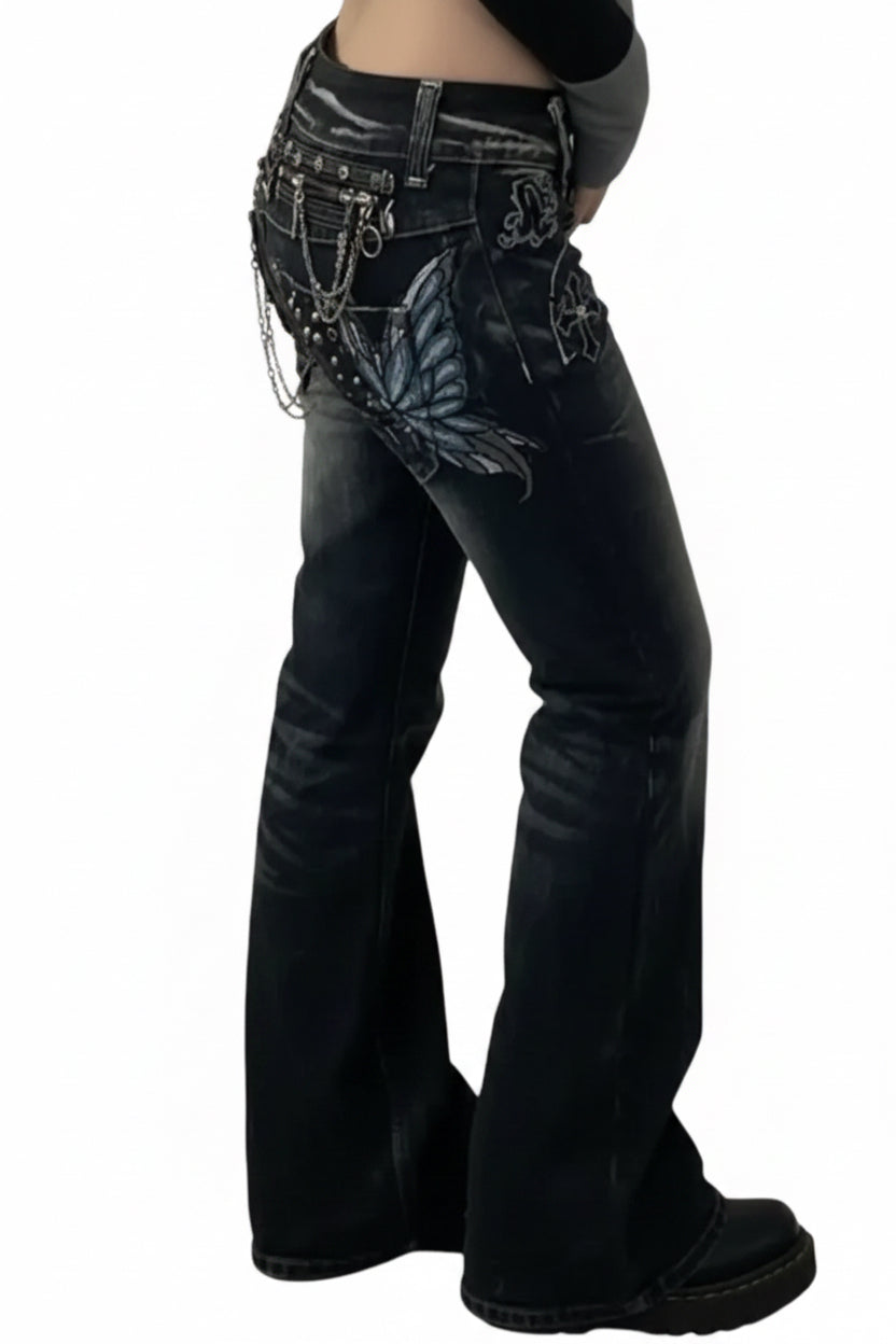 Blue butterfly embellished jeans with silver hardware