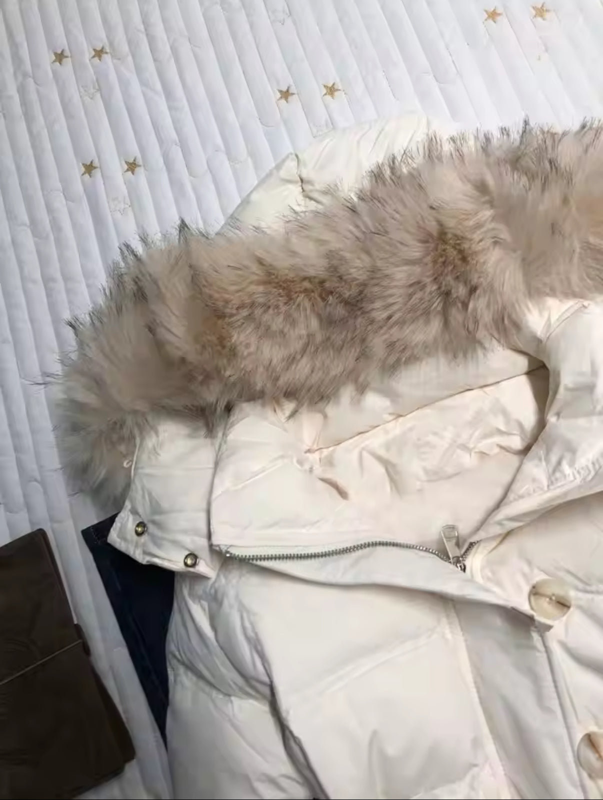 White puffer jacket with fur hood