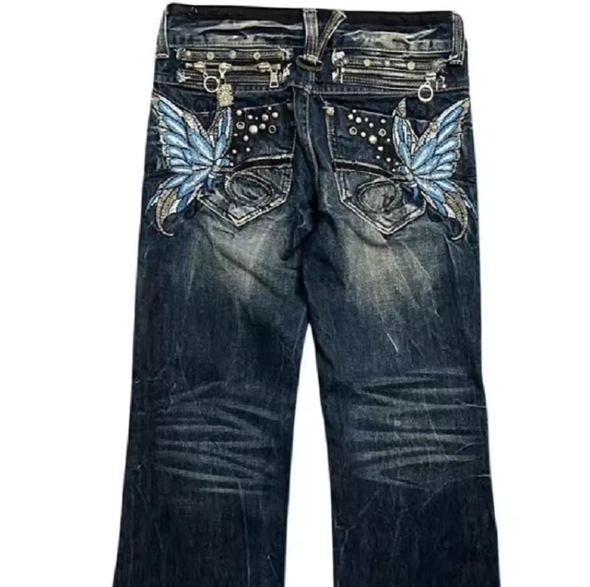 Blue butterfly embellished jeans with silver hardware