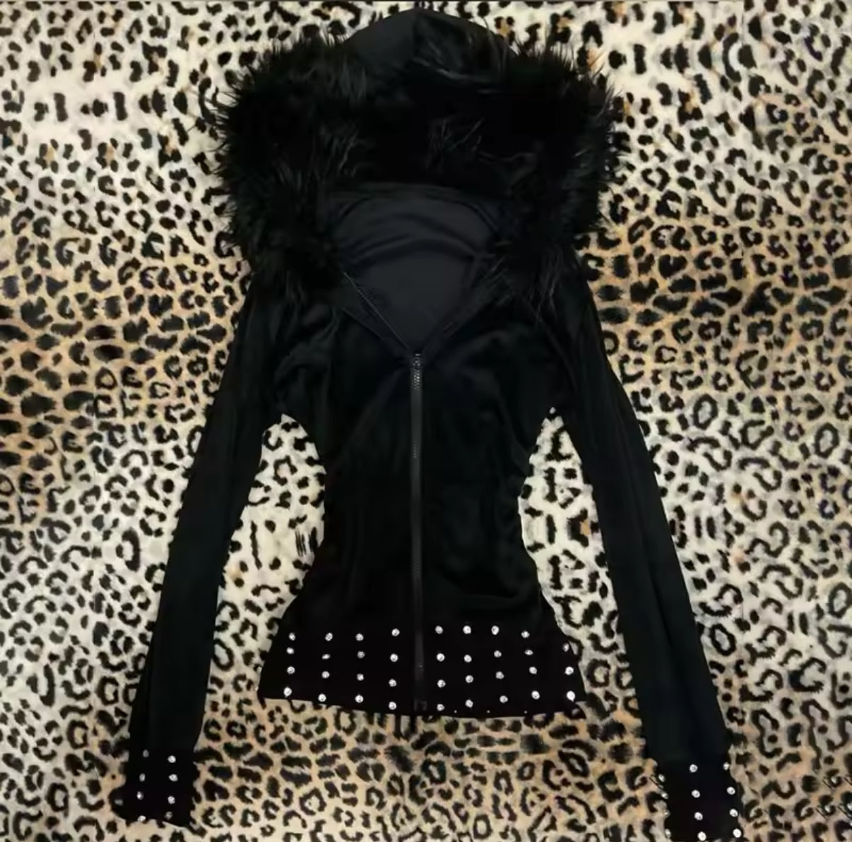 Black faux fur hooded jacket with rhinestone details